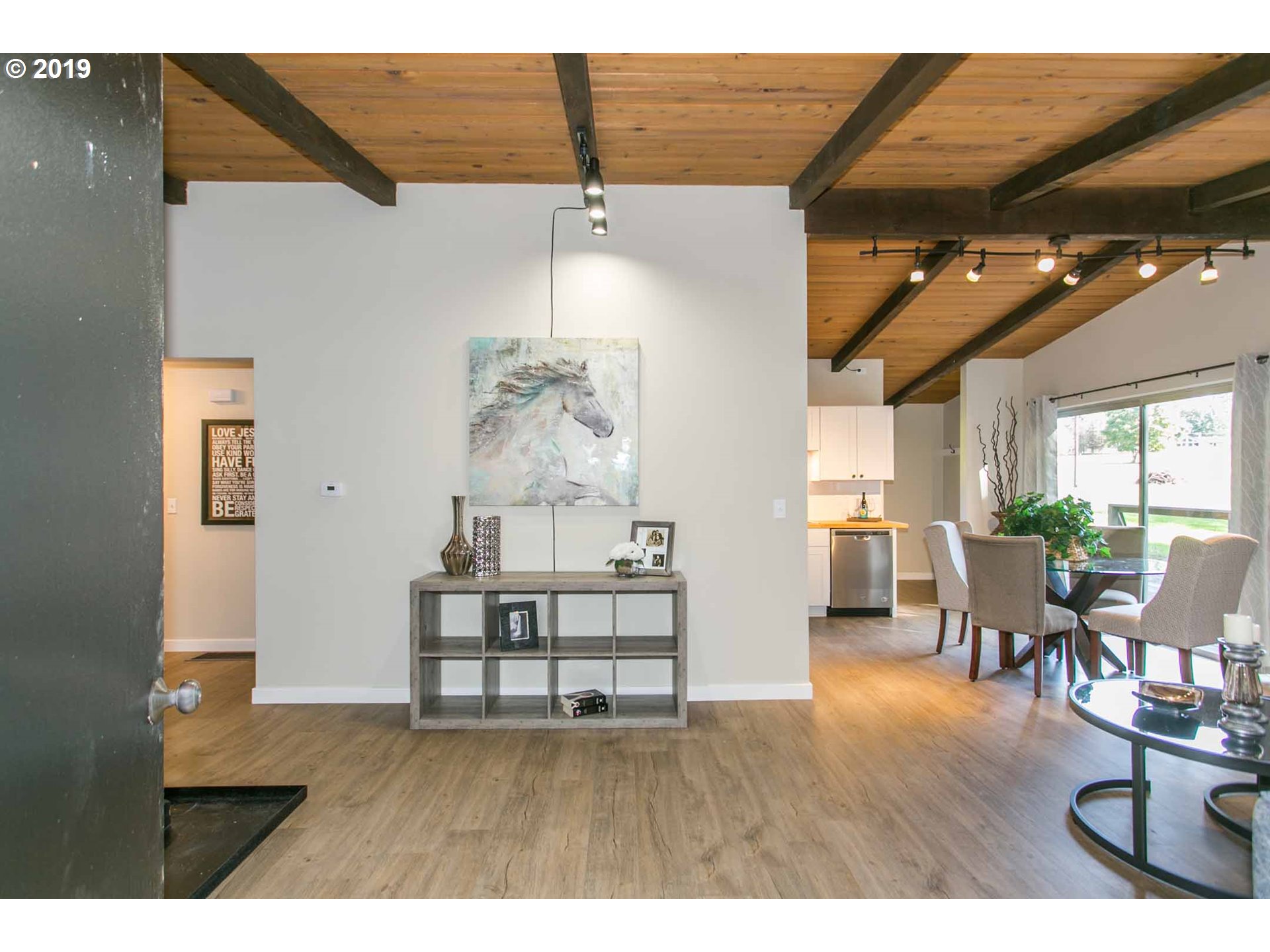 13010 South Union Hall Road Canby, OR 97013 - Photo 6 of 31 a room with lots of wooden furniture and a chandelier