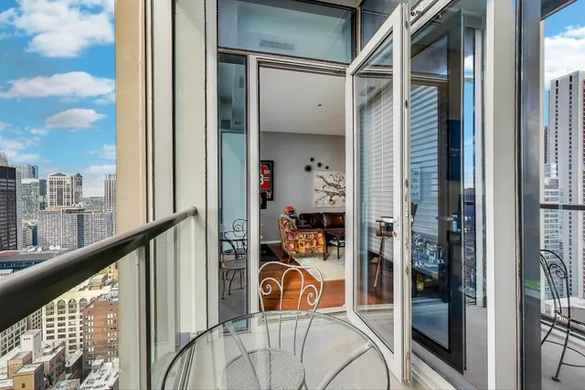 a view of a gym with lots of gym equipment