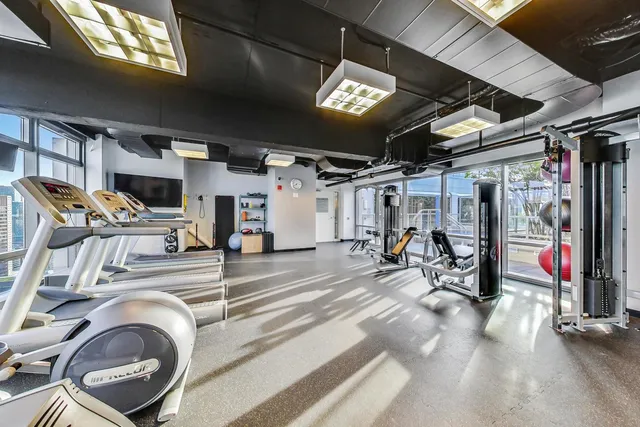 a view of a room with gym equipment