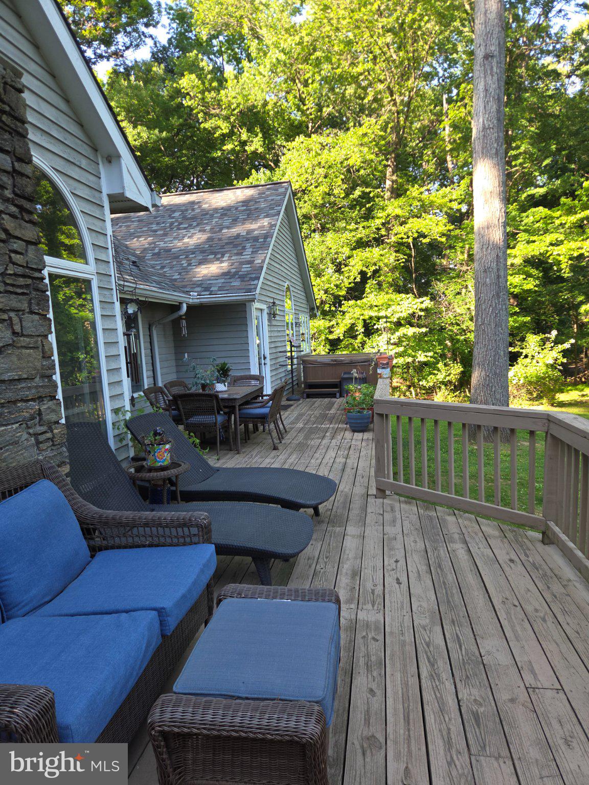 151 Martz Road Sykesville, MD 21784 - Photo 63 of 74 Serene deck amidst lush greenery.