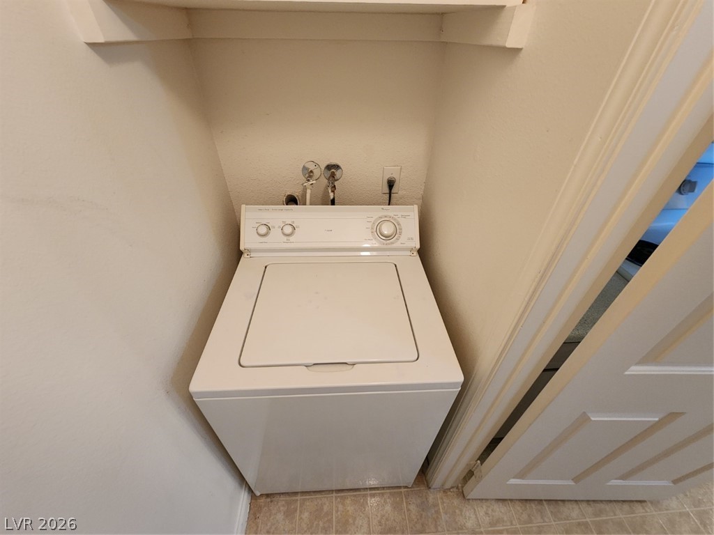 231 West Horizon Ridge Parkway, Unit 417 Henderson, NV 89012 - Photo 18 of 39 Laundry area featuring washer / dryer