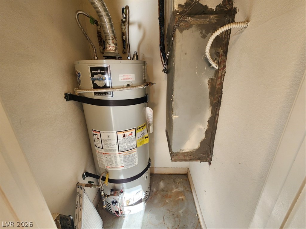 231 West Horizon Ridge Parkway, Unit 417 Henderson, NV 89012 - Photo 21 of 39 Utility room featuring water heater