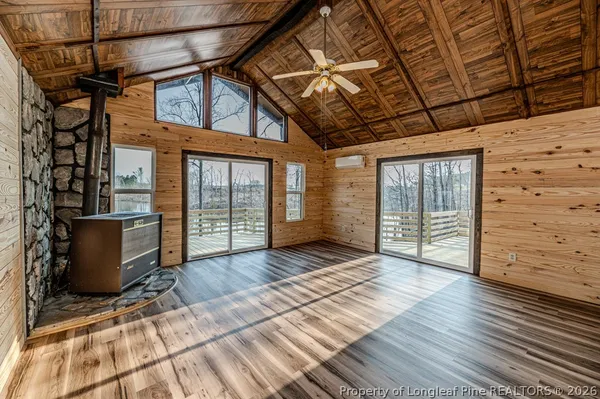 a view of outdoor space with wooden floor