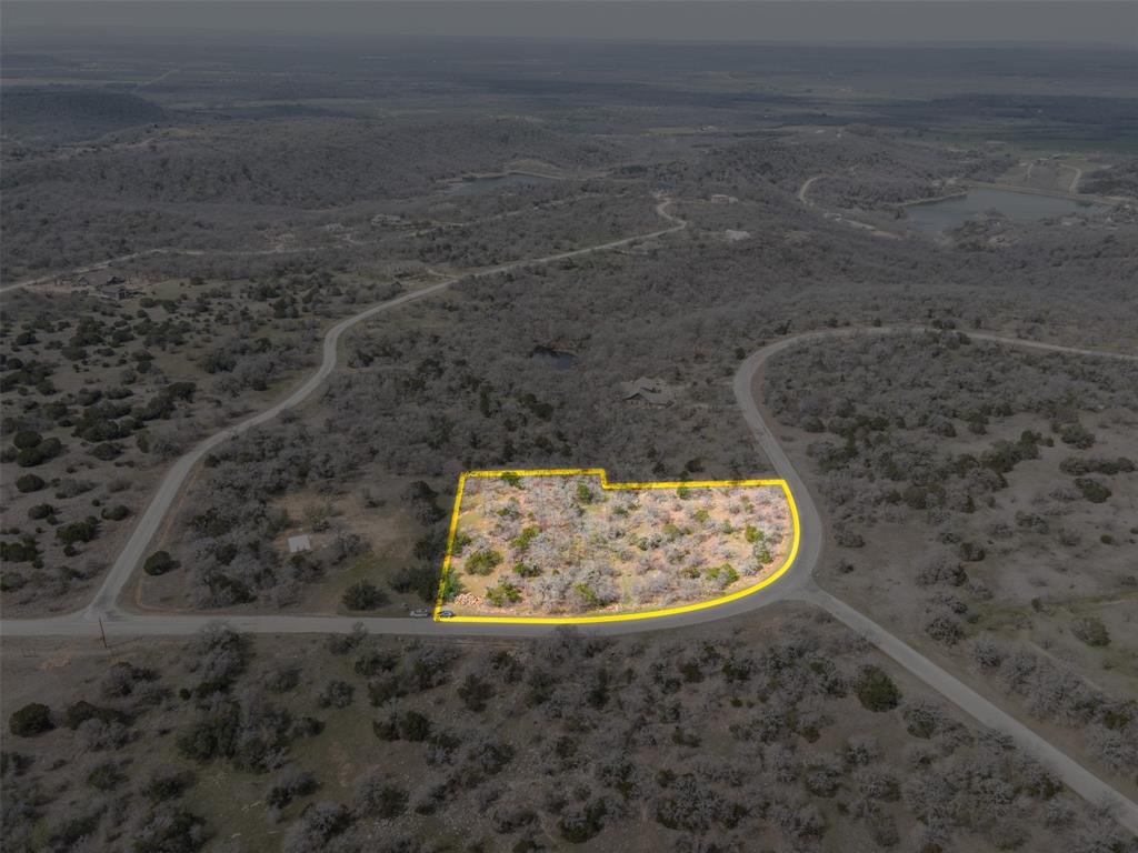 E49 R Art's Way Gordon, TX 76453 - Photo 3 of 26 a view of water heater in a yard