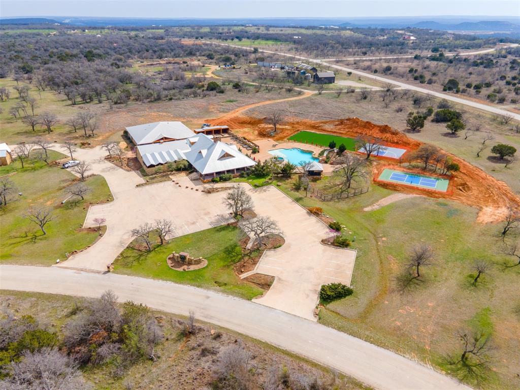E49 R Art's Way Gordon, TX 76453 - Photo 10 of 26 an aerial view of residential houses with outdoor space