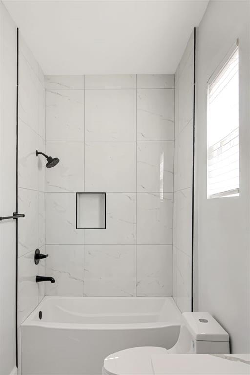 3087 Semmes Street Atlanta, GA 30344 - Photo 12 of 18 a bathroom with a bathtub and a shower