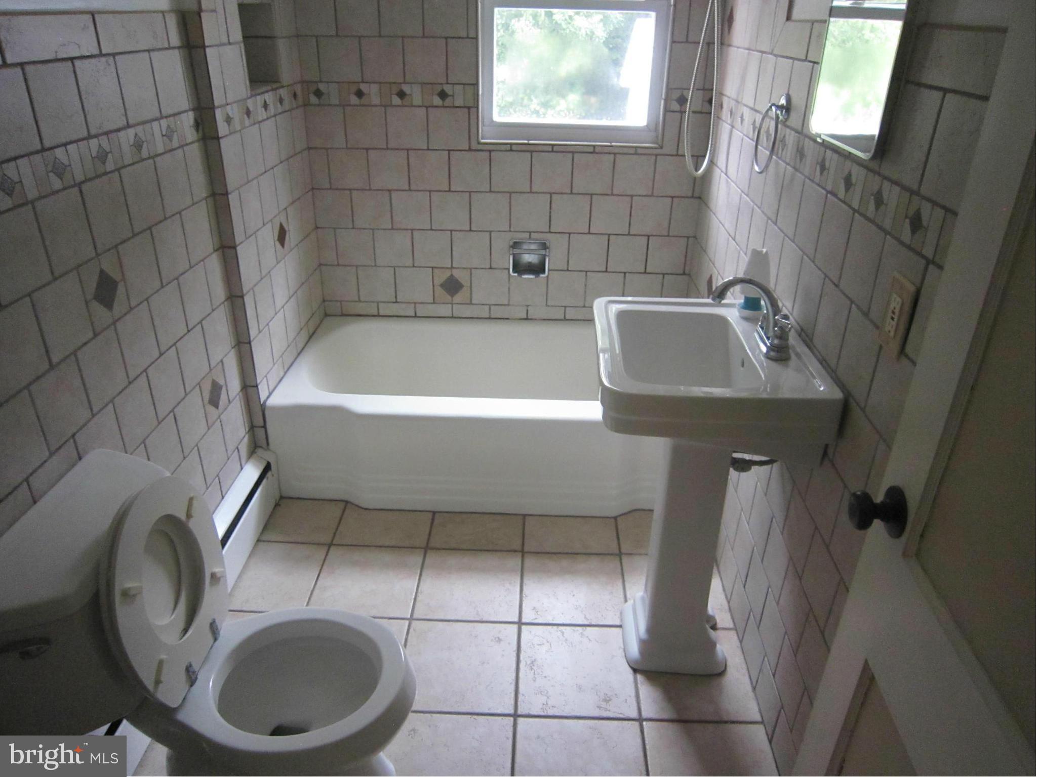 4000 Maple Grove Road Hampstead, MD 21074 - Photo 13 of 28 Bath with ceramic floor and walls