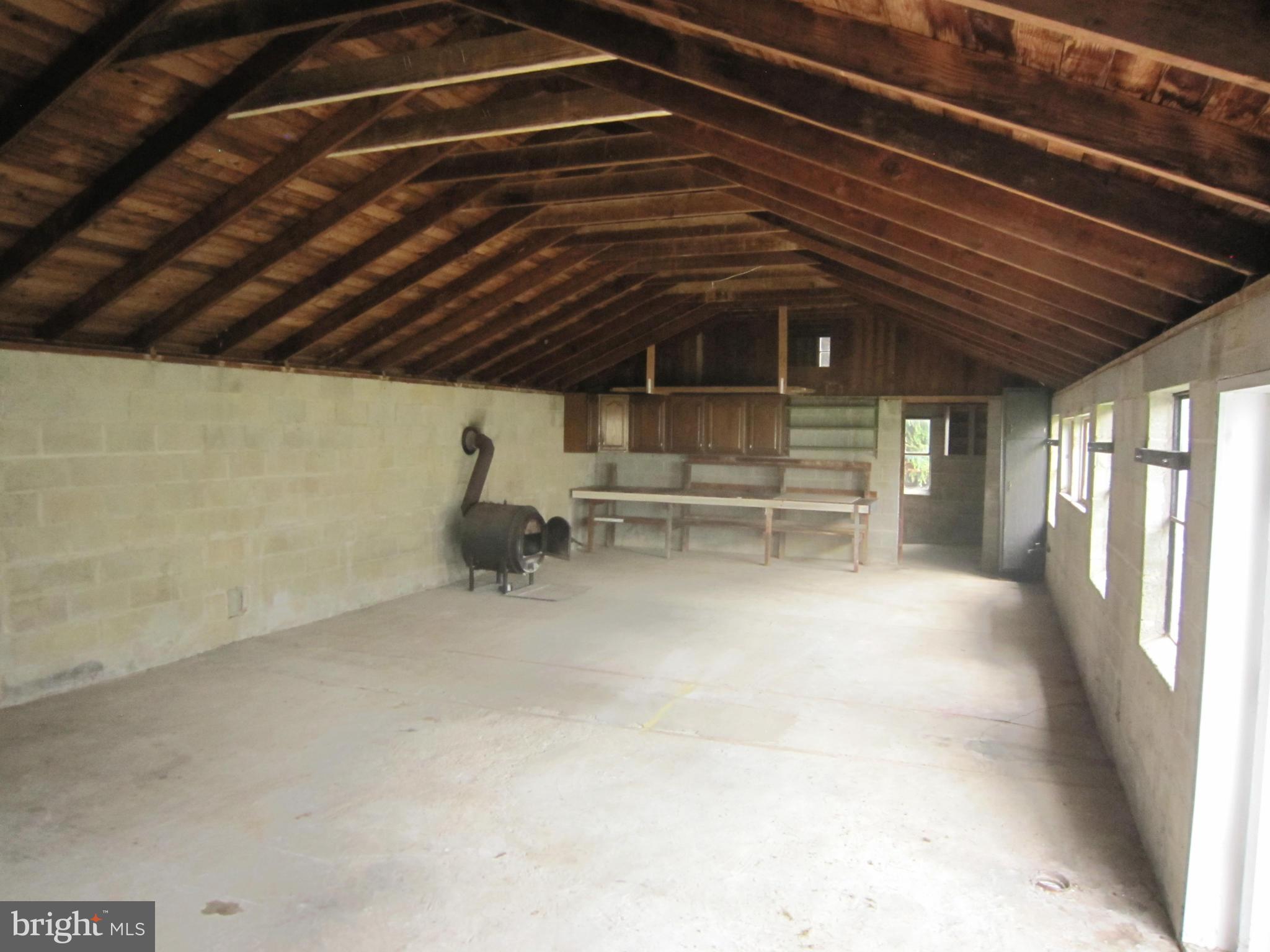 4000 Maple Grove Road Hampstead, MD 21074 - Photo 27 of 28 Inside of 50 x20 outbuilding with woodstove