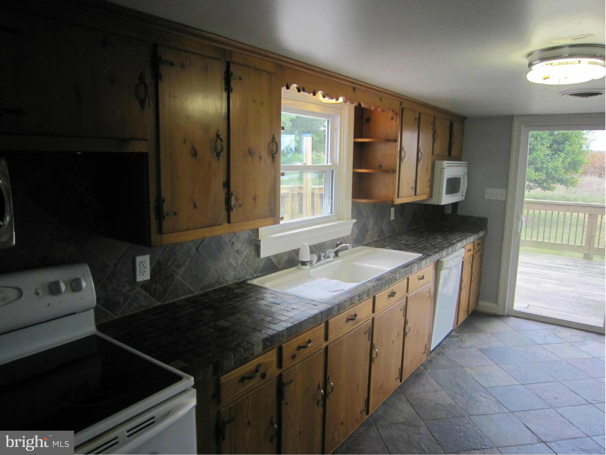 4000 Maple Grove Road Hampstead, MD 21074 - Photo 10 of 28 Kitchen with slider to deck