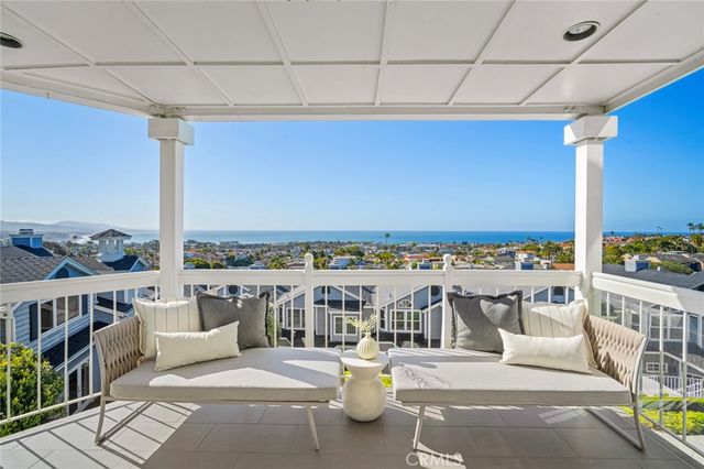 a view of a balcony with city view