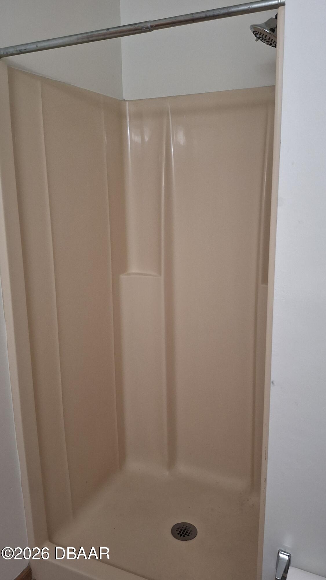 1302 Deer Springs Road Port Orange, FL 32129 - Photo 26 of 43 a bathroom with a glass shower door