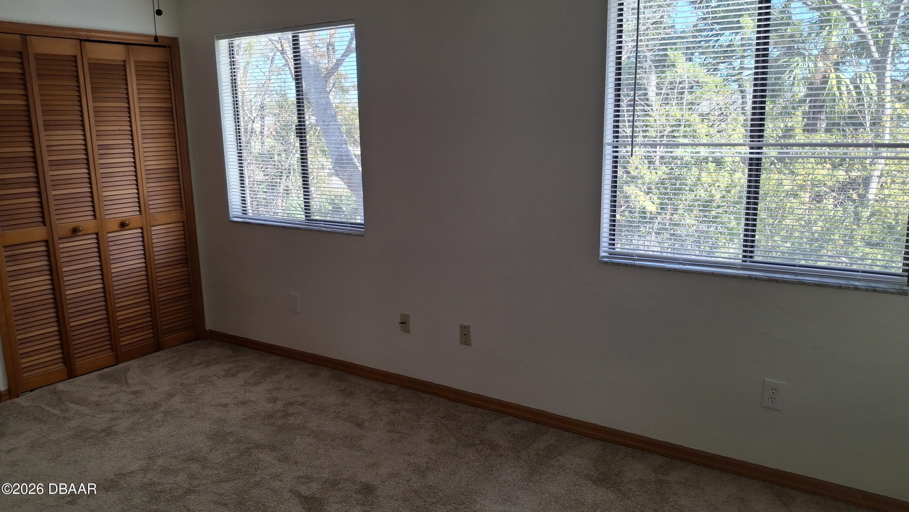 1302 Deer Springs Road Port Orange, FL 32129 - Photo 30 of 43 an empty room with a window