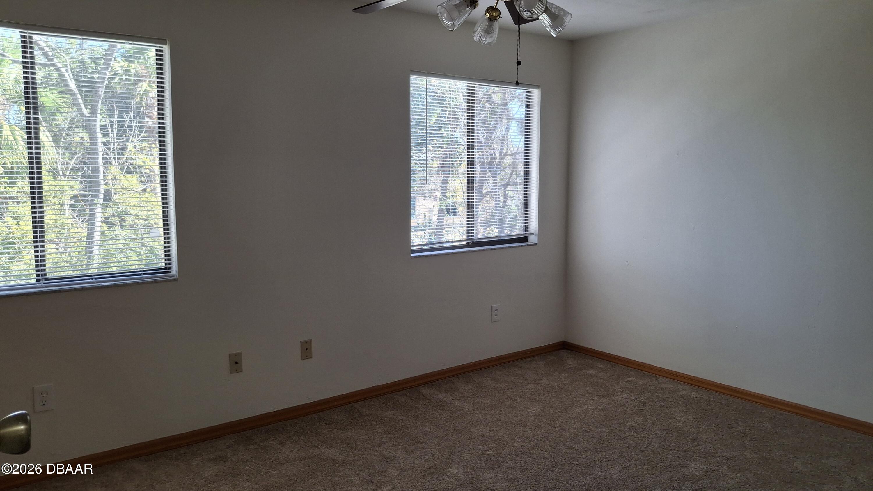 1302 Deer Springs Road Port Orange, FL 32129 - Photo 32 of 43 an empty room with a window