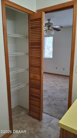 a bathroom with a toilet a sink and shower