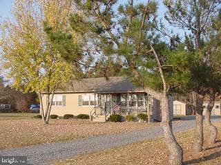 33364 Bob Smith Road Delmar, MD 21875 - Photo 6 of 6 a view of a house with a yard