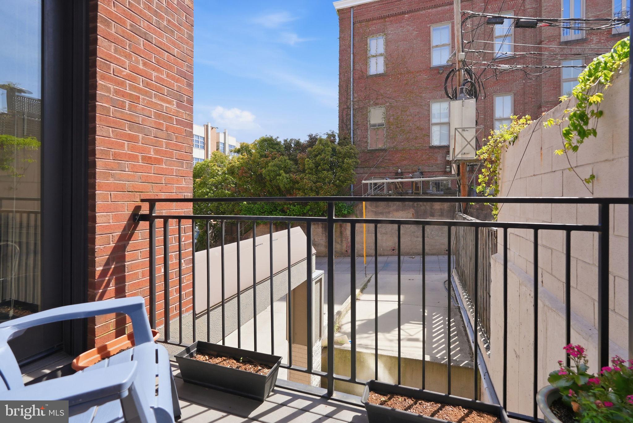 1700 Euclid Street Northwest, Unit B3 Washington, DC 20009 - Photo 10 of 17 a view of balcony with furniture