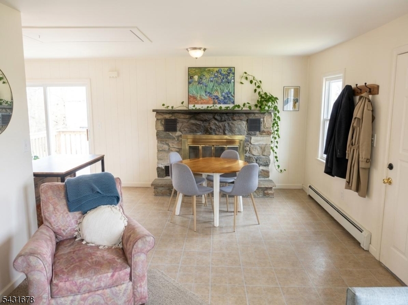 48 Vail Road Landing, NJ 07850 - Photo 8 of 23 a dining room with furniture and a large window