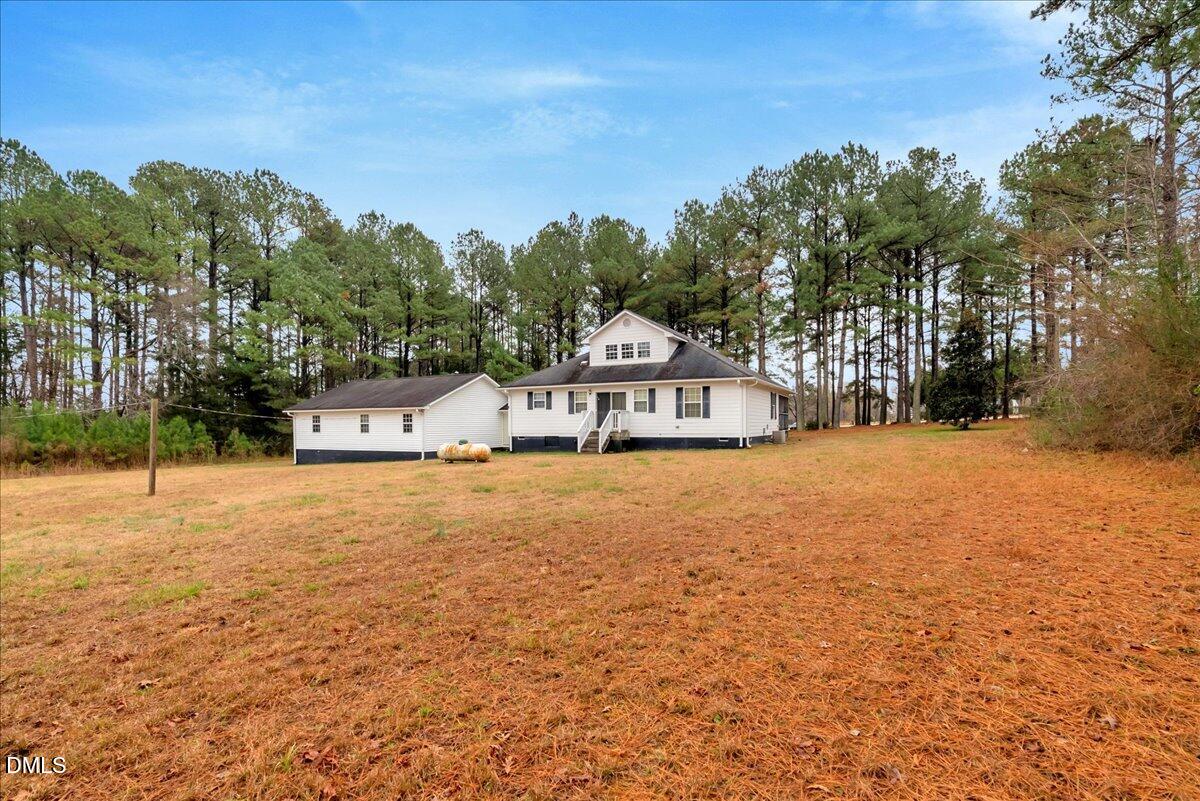 656 No Bottom Road Warrenton, NC 27589 - Photo 24 of 26 a house with trees in the background