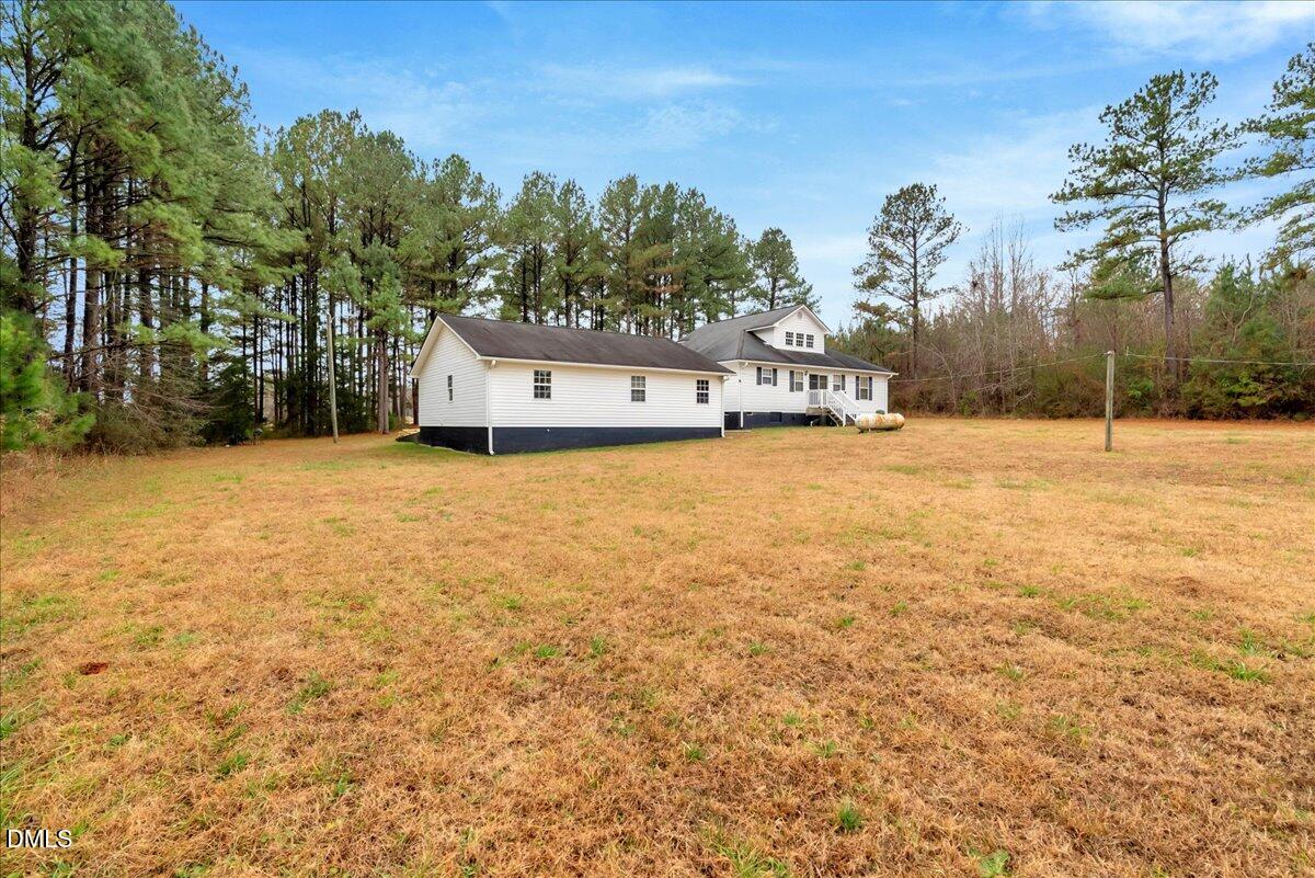 656 No Bottom Road Warrenton, NC 27589 - Photo 25 of 26 a view of a house with a yard