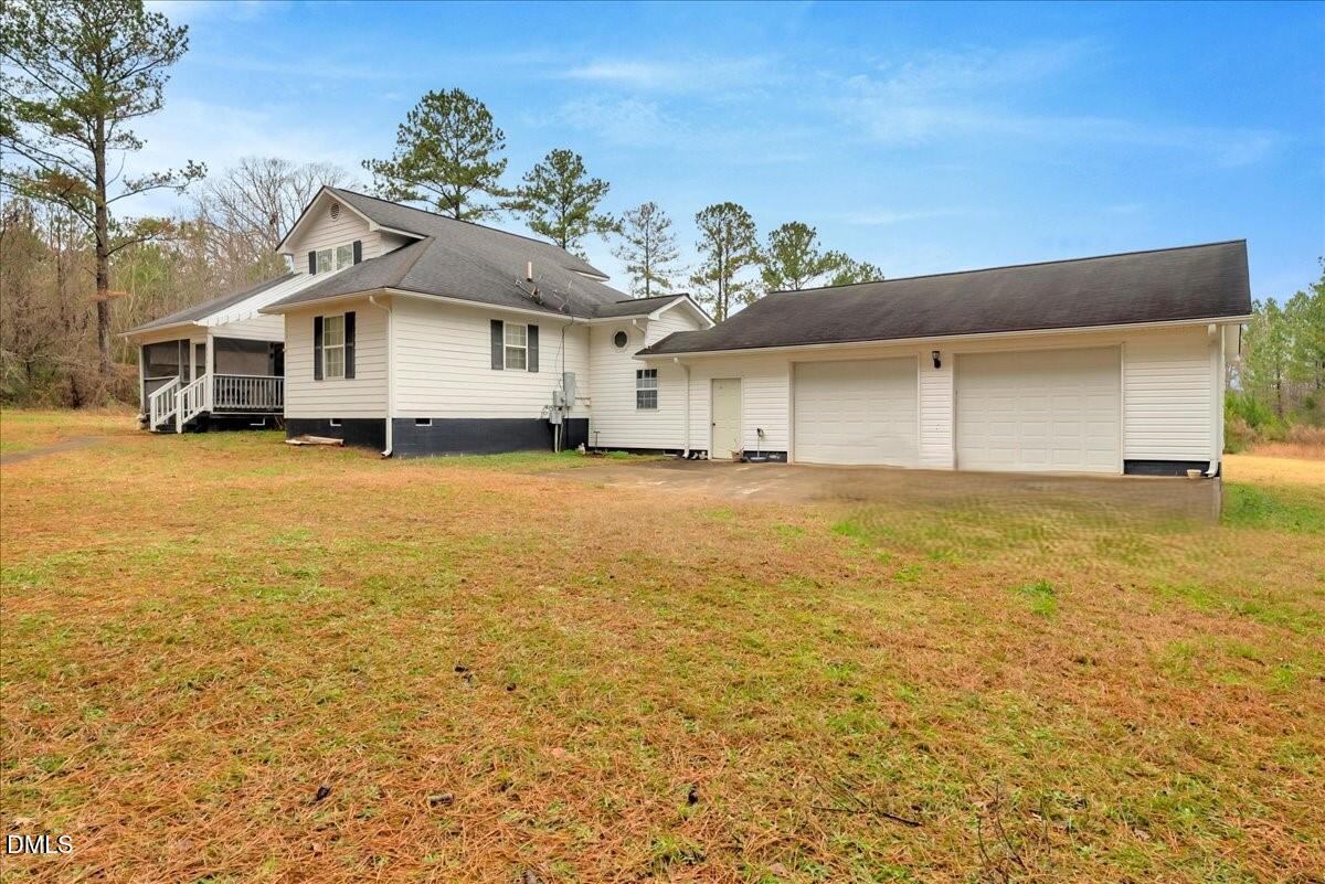 656 No Bottom Road Warrenton, NC 27589 - Photo 4 of 26 a front view of house with yard and trees
