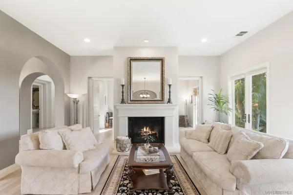 a view of a livingroom with furniture hardwood floor and a living room