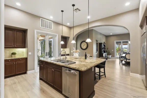 a spacious bathroom with a shower and a sink