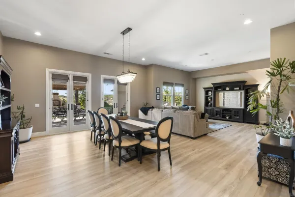 a bathroom with a double vanity sink toilet mirror and shower