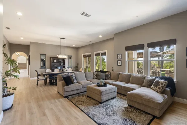 a spacious bedroom with a bed and window