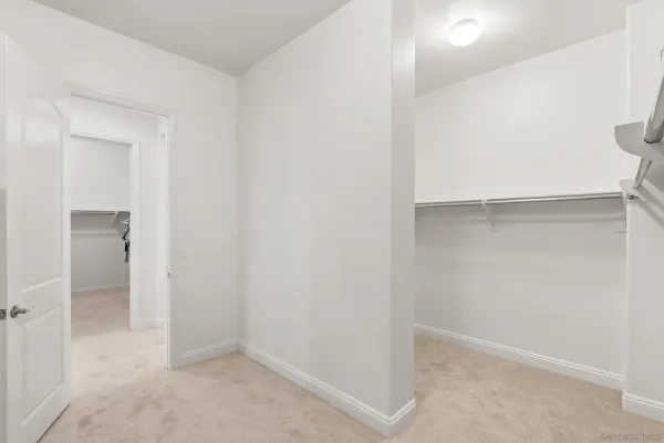 a picture of a bathroom with a shower