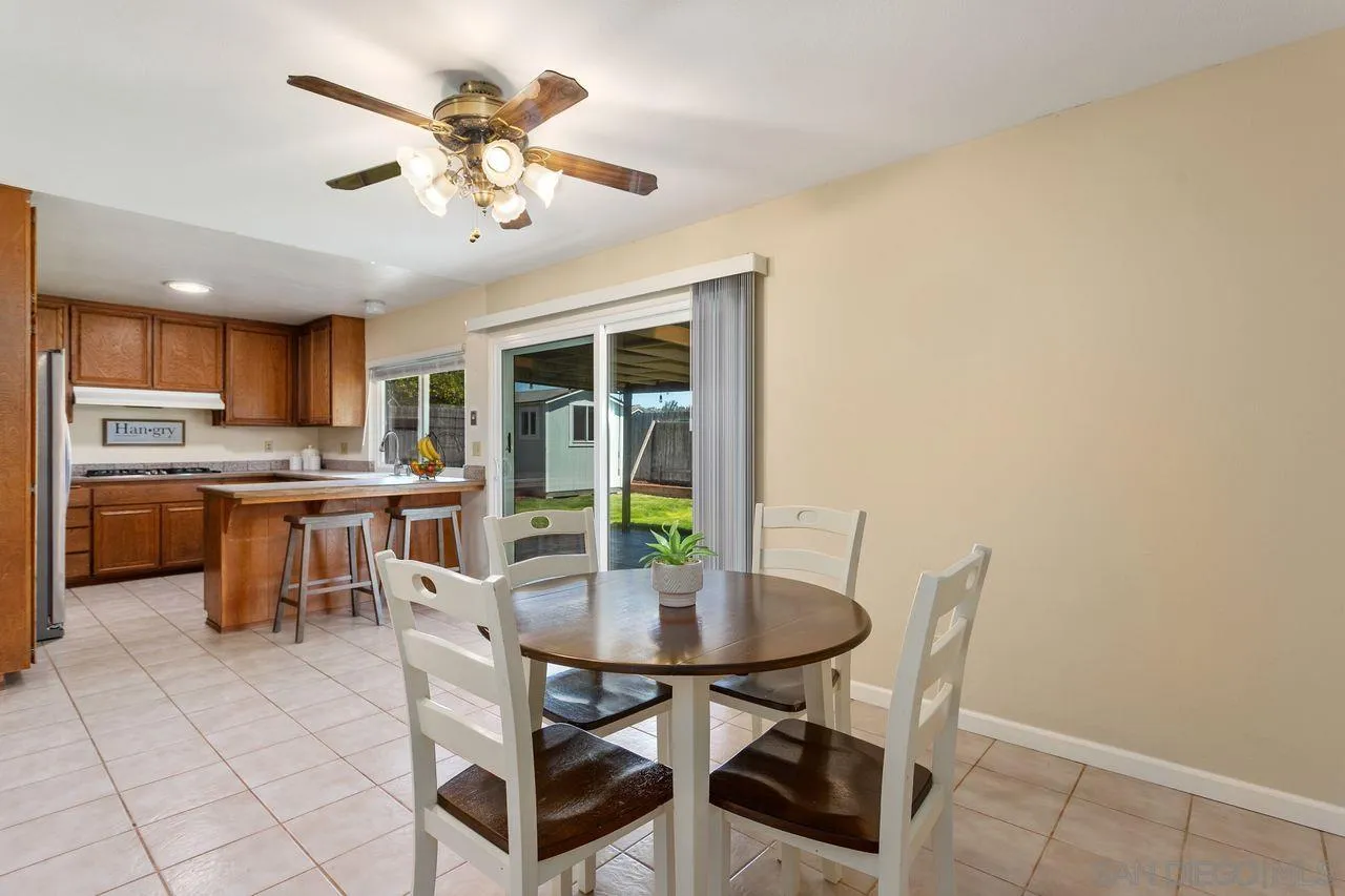 12805 Pinefield Road Poway, CA 92064 - Photo 14 of 31 a view of a dining room with furniture