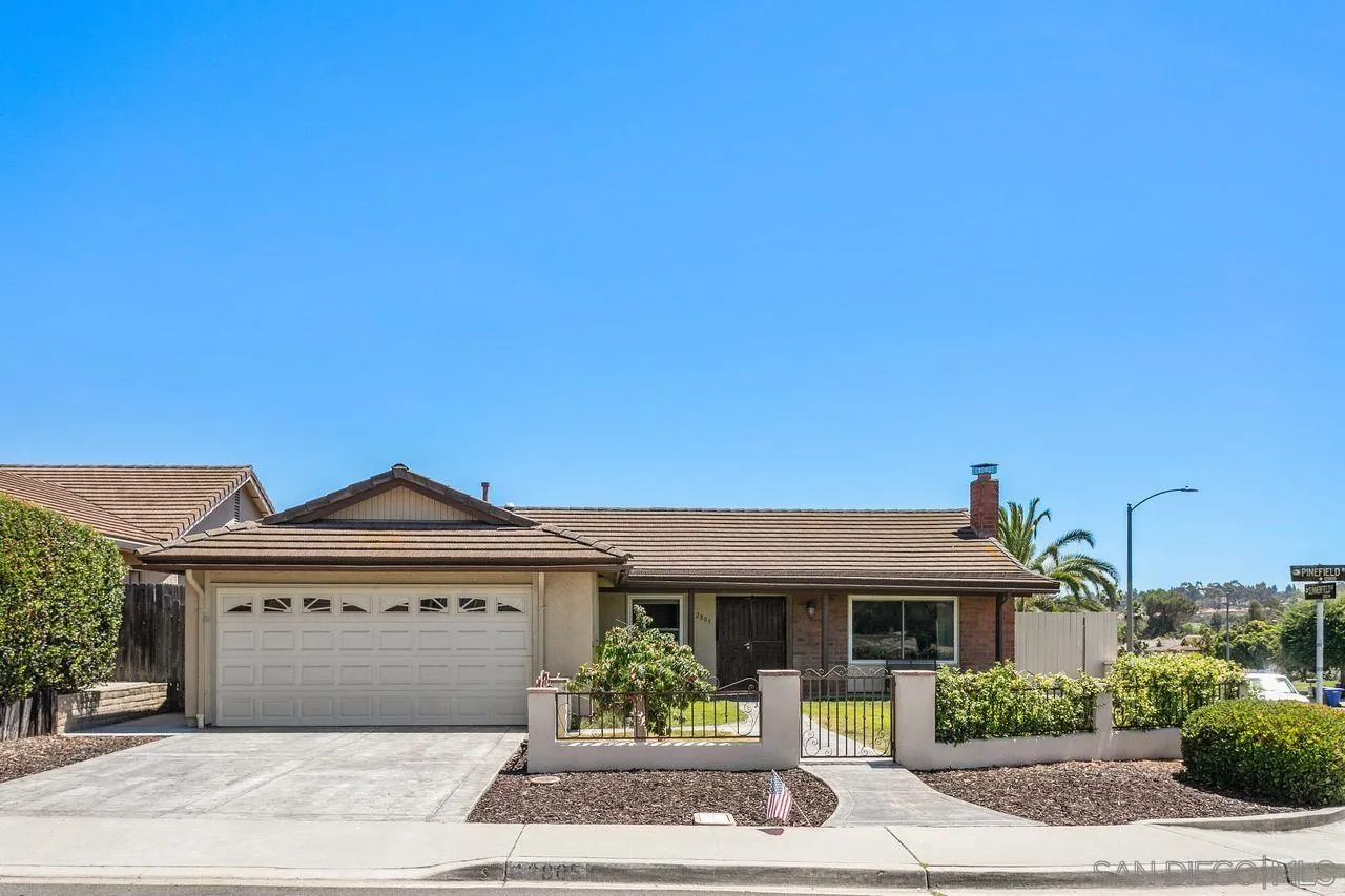 12805 Pinefield Road Poway, CA 92064 - Photo 2 of 31 a front view of a house with garden