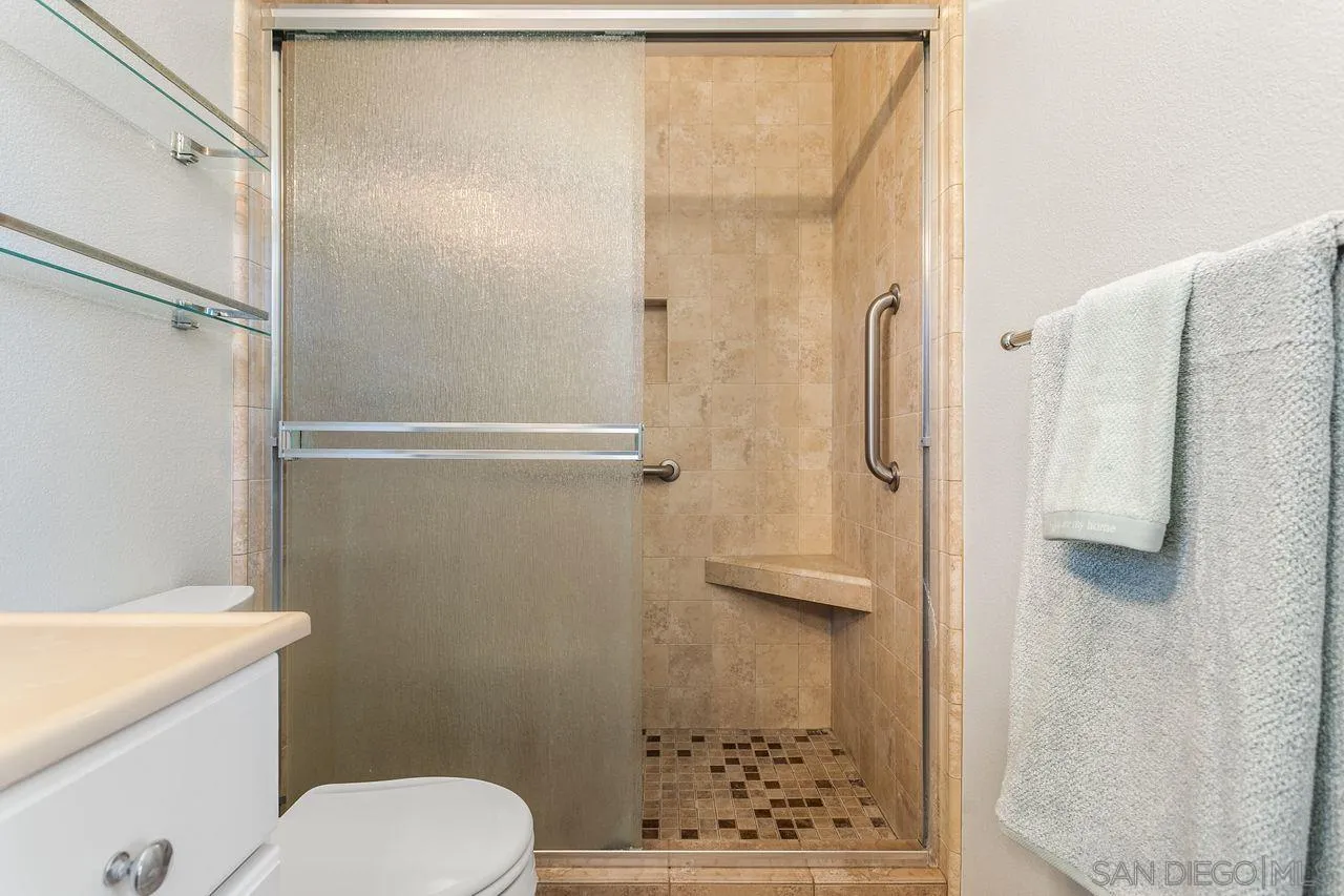12805 Pinefield Road Poway, CA 92064 - Photo 21 of 31 a bathroom with a shower and a toilet