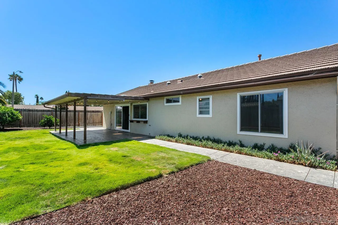 12805 Pinefield Road Poway, CA 92064 - Photo 26 of 31 a view of a house with backyard and garden
