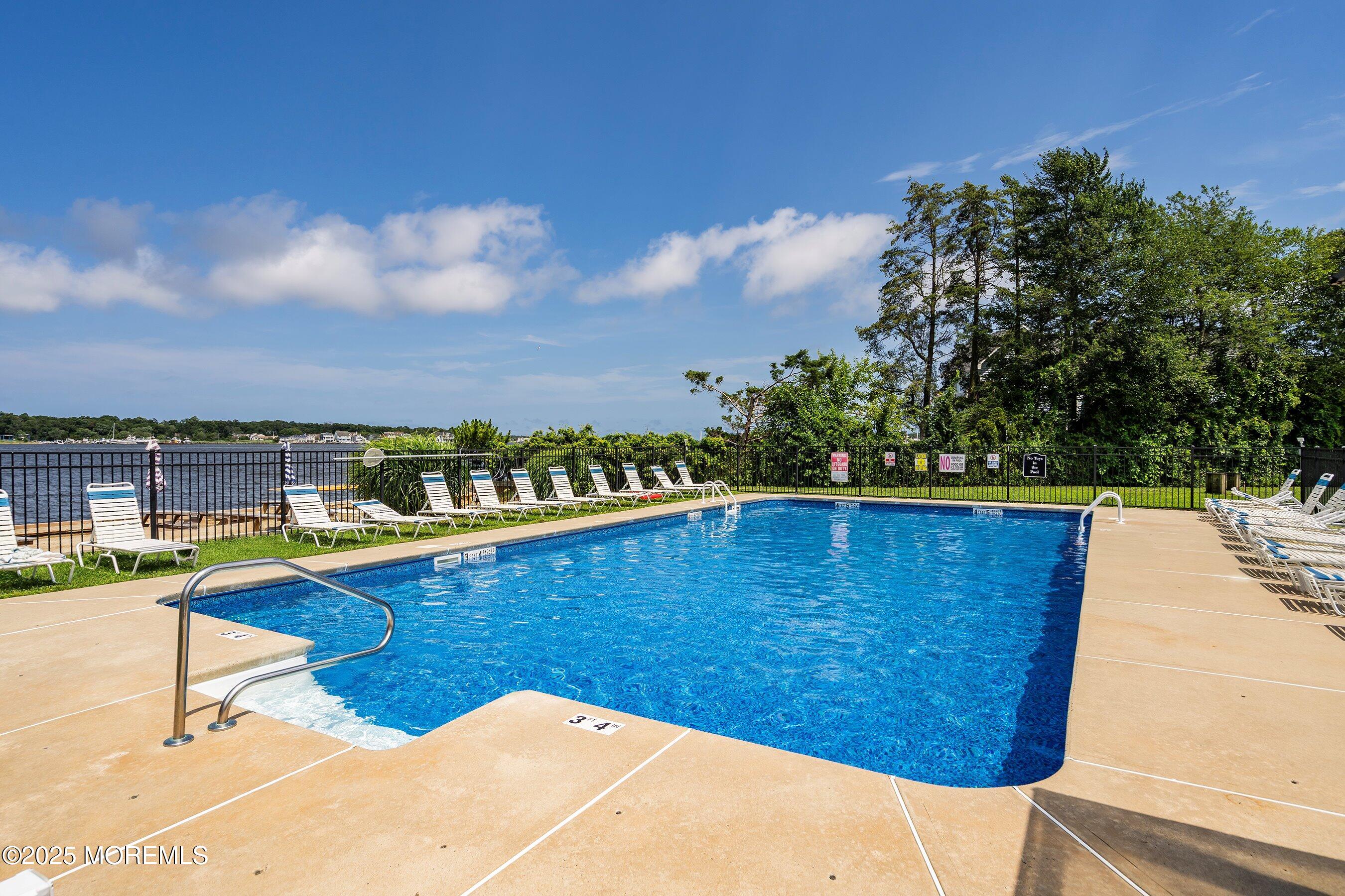 54 Buckingham Road Brick, NJ 08723 - Photo 16 of 35 a view of swimming pool with lounge chair in the backyard