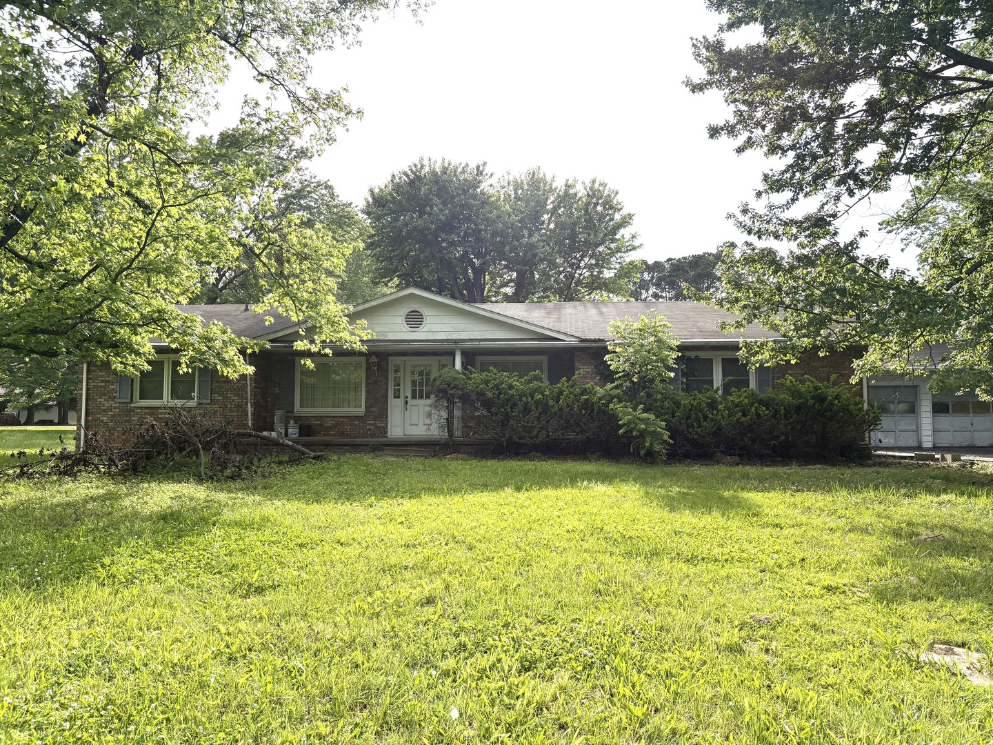 3917 Country Club Road Carbondale, IL 62901 - Photo 1 of 32 a front view of house with yard and trees in the background