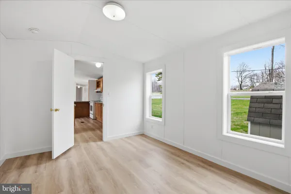 a view of livingroom with furniture and window