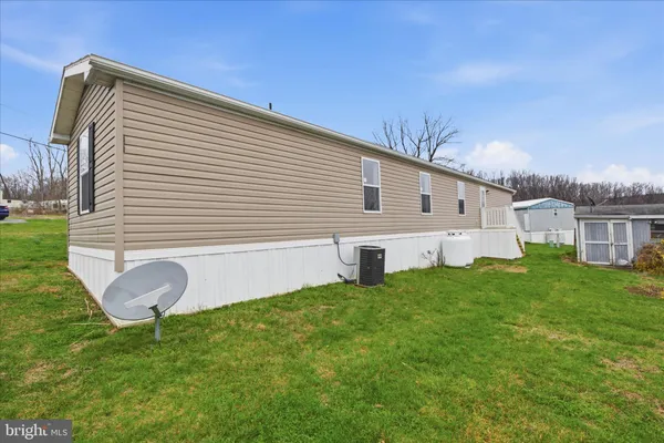 a bathroom with a sink and a yard
