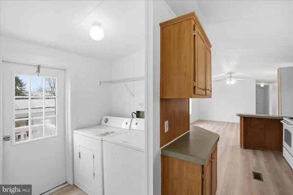 a utility room with dryer and washer