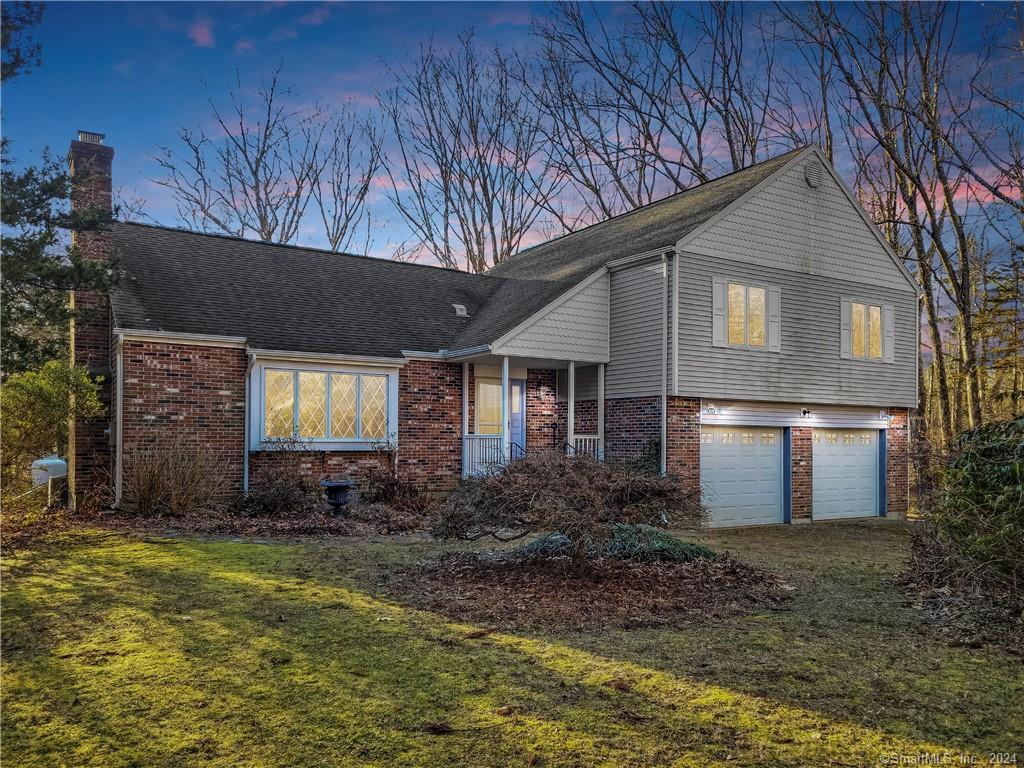 26 Devonshire Drive Ledyard, CT 06335 - Photo 1 of 1 a front view of house with garden
