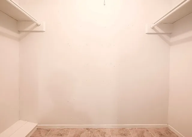 a view of small space with racks on the wall