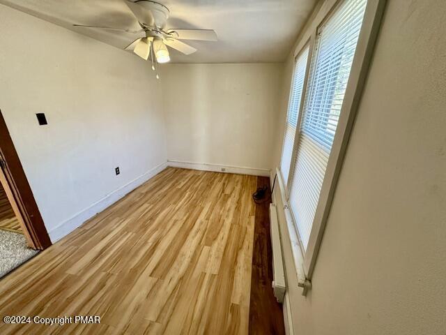 349 Shine Hill Road Henryville, PA 18332 - Photo 17 of 25 a view of a hallway with wooden floor and staircase