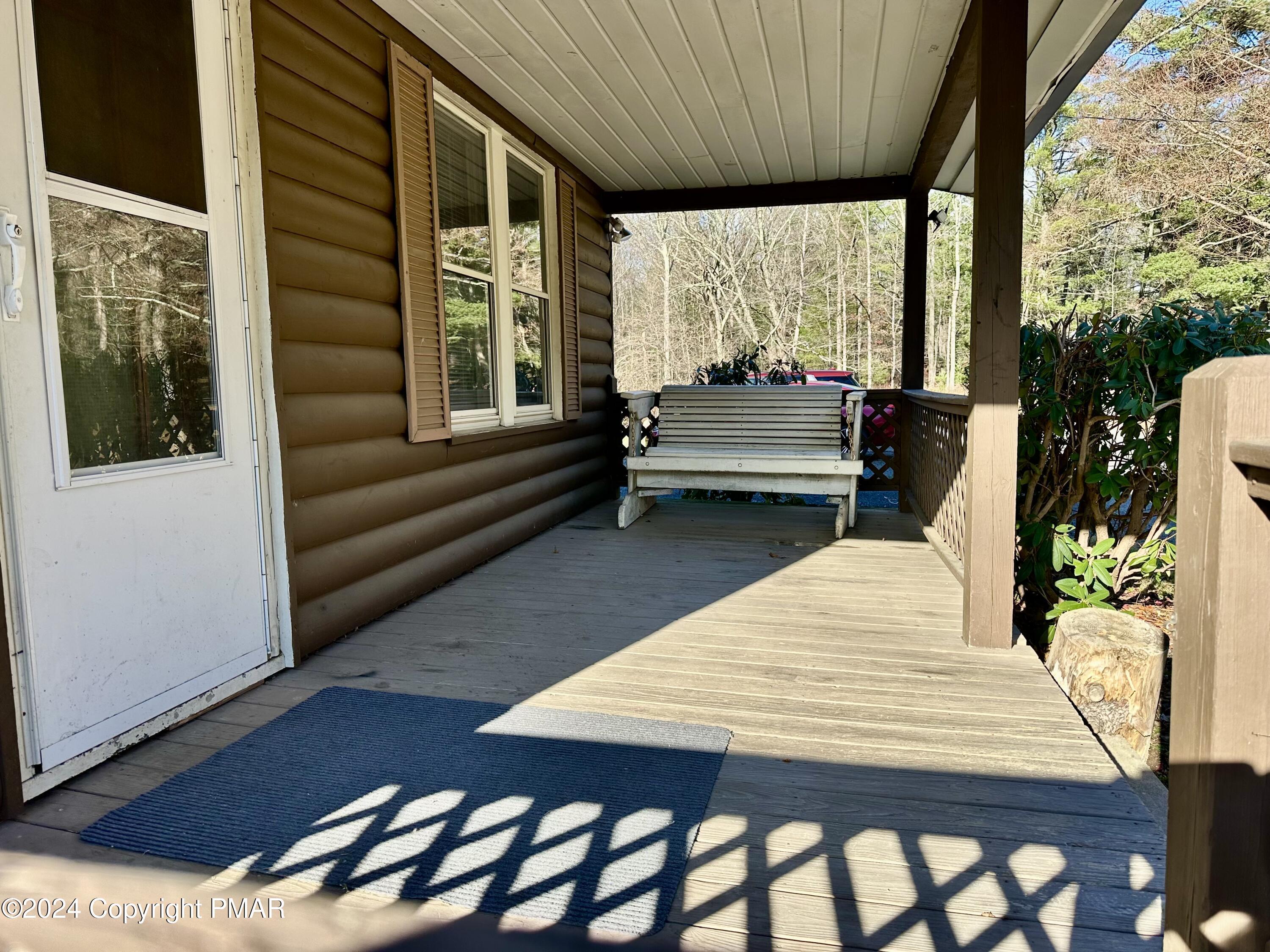349 Shine Hill Road Henryville, PA 18332 - Photo 3 of 25 a balcony view with a seating space