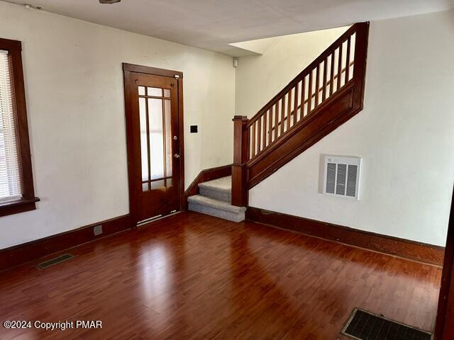 349 Shine Hill Road Henryville, PA 18332 - Photo 5 of 25 a view of an entryway with wooden floor and stairs