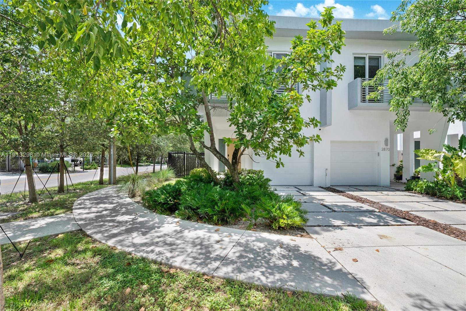 2868 Southwest 33rd Court, Unit 2868 Miami, FL 33133 - Photo 13 of 15 a pathway of a house with a yard