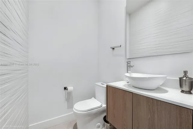 a bathroom with a sink and a toilet