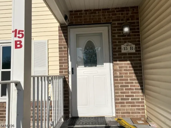 a view of a door and a window