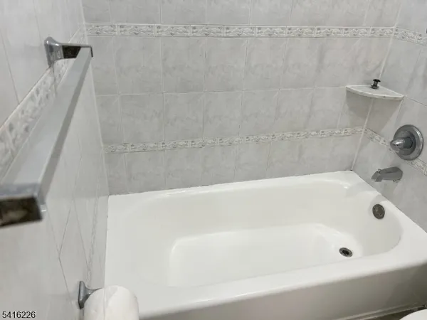 a bathroom with a toilet and a sink