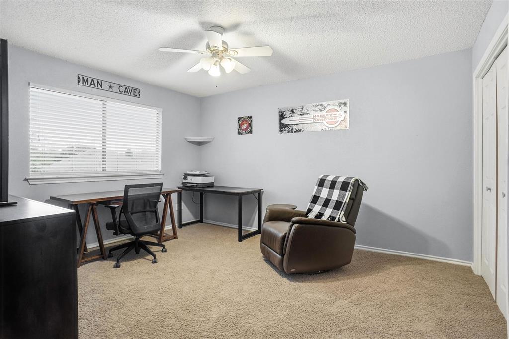 2613 Stone Hollow Drive Bedford, TX 76021 - Photo 20 of 33 a view of a workspace with furniture and a window