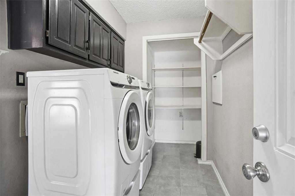 2613 Stone Hollow Drive Bedford, TX 76021 - Photo 22 of 33 a utility room with dryer and washer