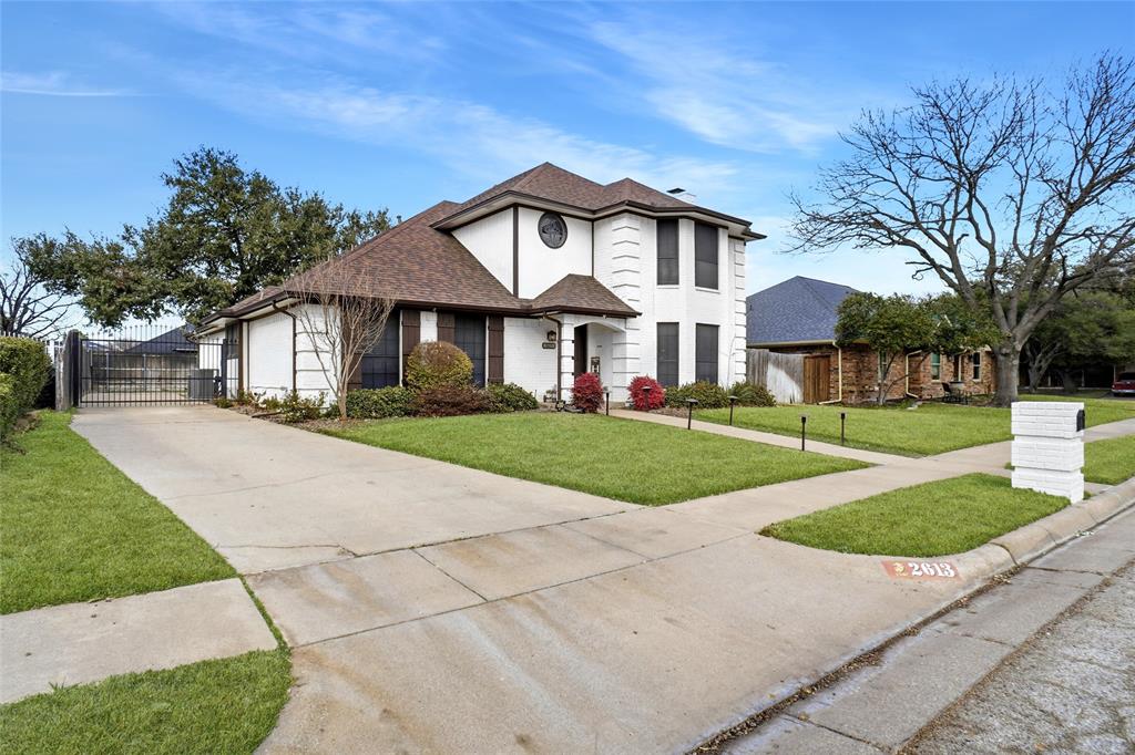 2613 Stone Hollow Drive Bedford, TX 76021 - Photo 28 of 33 a front view of a house with a yard